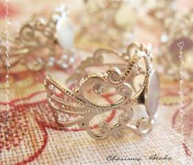 84 Platinum Brass Filigree Adjustable Ring Shanks 18mm, 16mm